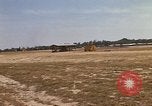 Image of USAF F-4C aircraft landing with drogue chute Ubon Ratchathani Thailand, 1967, second 19 stock footage video 65675038909