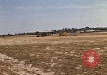Image of USAF F-4C aircraft landing with drogue chute Ubon Ratchathani Thailand, 1967, second 20 stock footage video 65675038909