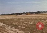 Image of USAF F-4C aircraft landing with drogue chute Ubon Ratchathani Thailand, 1967, second 21 stock footage video 65675038909