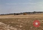 Image of USAF F-4C aircraft landing with drogue chute Ubon Ratchathani Thailand, 1967, second 24 stock footage video 65675038909