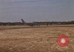 Image of USAF F-4C aircraft landing with drogue chute Ubon Ratchathani Thailand, 1967, second 26 stock footage video 65675038909