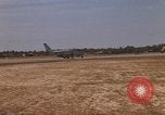 Image of USAF F-4C aircraft landing with drogue chute Ubon Ratchathani Thailand, 1967, second 28 stock footage video 65675038909