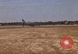 Image of USAF F-4C aircraft landing with drogue chute Ubon Ratchathani Thailand, 1967, second 30 stock footage video 65675038909