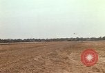 Image of USAF F-4C aircraft landing with drogue chute Ubon Ratchathani Thailand, 1967, second 41 stock footage video 65675038909