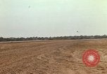 Image of USAF F-4C aircraft landing with drogue chute Ubon Ratchathani Thailand, 1967, second 42 stock footage video 65675038909