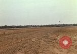 Image of USAF F-4C aircraft landing with drogue chute Ubon Ratchathani Thailand, 1967, second 44 stock footage video 65675038909