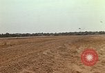 Image of USAF F-4C aircraft landing with drogue chute Ubon Ratchathani Thailand, 1967, second 45 stock footage video 65675038909