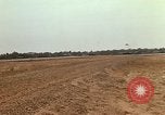 Image of USAF F-4C aircraft landing with drogue chute Ubon Ratchathani Thailand, 1967, second 46 stock footage video 65675038909