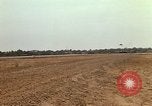 Image of USAF F-4C aircraft landing with drogue chute Ubon Ratchathani Thailand, 1967, second 47 stock footage video 65675038909