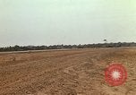 Image of USAF F-4C aircraft landing with drogue chute Ubon Ratchathani Thailand, 1967, second 48 stock footage video 65675038909