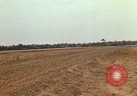 Image of USAF F-4C aircraft landing with drogue chute Ubon Ratchathani Thailand, 1967, second 50 stock footage video 65675038909