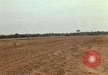 Image of USAF F-4C aircraft landing with drogue chute Ubon Ratchathani Thailand, 1967, second 51 stock footage video 65675038909