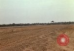 Image of USAF F-4C aircraft landing with drogue chute Ubon Ratchathani Thailand, 1967, second 52 stock footage video 65675038909