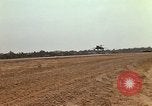 Image of USAF F-4C aircraft landing with drogue chute Ubon Ratchathani Thailand, 1967, second 54 stock footage video 65675038909