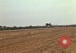 Image of USAF F-4C aircraft landing with drogue chute Ubon Ratchathani Thailand, 1967, second 55 stock footage video 65675038909