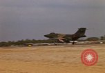 Image of USAF F-4C aircraft landing with drogue chute Ubon Ratchathani Thailand, 1967, second 59 stock footage video 65675038909