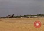 Image of USAF F-4C aircraft landing with drogue chute Ubon Ratchathani Thailand, 1967, second 60 stock footage video 65675038909