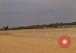 Image of USAF F-4C aircraft landing with drogue chute Ubon Ratchathani Thailand, 1967, second 61 stock footage video 65675038909
