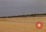 Image of USAF F-4C aircraft landing with drogue chute Ubon Ratchathani Thailand, 1967, second 62 stock footage video 65675038909