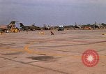 Image of RF-101 aircraft returning from a mission Ubon Ratchathani Thailand, 1967, second 3 stock footage video 65675038910