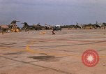 Image of RF-101 aircraft returning from a mission Ubon Ratchathani Thailand, 1967, second 4 stock footage video 65675038910
