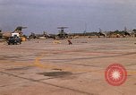 Image of RF-101 aircraft returning from a mission Ubon Ratchathani Thailand, 1967, second 10 stock footage video 65675038910
