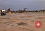Image of RF-101 aircraft returning from a mission Ubon Ratchathani Thailand, 1967, second 13 stock footage video 65675038910