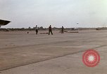 Image of RF-101 aircraft returning from a mission Ubon Ratchathani Thailand, 1967, second 39 stock footage video 65675038910