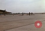 Image of RF-101 aircraft returning from a mission Ubon Ratchathani Thailand, 1967, second 44 stock footage video 65675038910