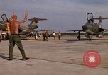 Image of RF-101 aircraft returning from a mission Ubon Ratchathani Thailand, 1967, second 61 stock footage video 65675038910