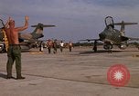 Image of RF-101 aircraft returning from a mission Ubon Ratchathani Thailand, 1967, second 62 stock footage video 65675038910