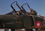Image of Ground crews meet RF-4C aircraft back from mission Ubon Ratchathani Thailand, 1967, second 9 stock footage video 65675038911