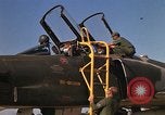 Image of Ground crews meet RF-4C aircraft back from mission Ubon Ratchathani Thailand, 1967, second 11 stock footage video 65675038911