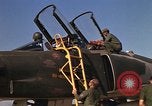 Image of Ground crews meet RF-4C aircraft back from mission Ubon Ratchathani Thailand, 1967, second 12 stock footage video 65675038911