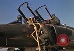 Image of Ground crews meet RF-4C aircraft back from mission Ubon Ratchathani Thailand, 1967, second 15 stock footage video 65675038911