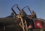 Image of Ground crews meet RF-4C aircraft back from mission Ubon Ratchathani Thailand, 1967, second 20 stock footage video 65675038911