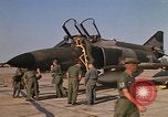 Image of Ground crews meet RF-4C aircraft back from mission Ubon Ratchathani Thailand, 1967, second 27 stock footage video 65675038911