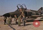 Image of Ground crews meet RF-4C aircraft back from mission Ubon Ratchathani Thailand, 1967, second 28 stock footage video 65675038911
