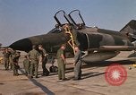 Image of Ground crews meet RF-4C aircraft back from mission Ubon Ratchathani Thailand, 1967, second 30 stock footage video 65675038911