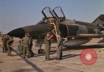 Image of Ground crews meet RF-4C aircraft back from mission Ubon Ratchathani Thailand, 1967, second 31 stock footage video 65675038911