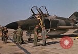 Image of Ground crews meet RF-4C aircraft back from mission Ubon Ratchathani Thailand, 1967, second 32 stock footage video 65675038911