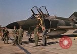 Image of Ground crews meet RF-4C aircraft back from mission Ubon Ratchathani Thailand, 1967, second 33 stock footage video 65675038911