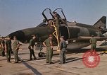 Image of Ground crews meet RF-4C aircraft back from mission Ubon Ratchathani Thailand, 1967, second 37 stock footage video 65675038911