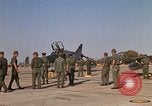 Image of Ground crews meet RF-4C aircraft back from mission Ubon Ratchathani Thailand, 1967, second 54 stock footage video 65675038911