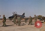 Image of Ground crews meet RF-4C aircraft back from mission Ubon Ratchathani Thailand, 1967, second 59 stock footage video 65675038911