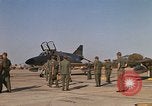Image of Ground crews meet RF-4C aircraft back from mission Ubon Ratchathani Thailand, 1967, second 60 stock footage video 65675038911