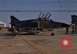 Image of Ground crew with returning RF-4C aircraft Ubon Ratchathani Thailand, 1967, second 1 stock footage video 65675038915