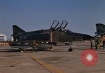 Image of Ground crew with returning RF-4C aircraft Ubon Ratchathani Thailand, 1967, second 4 stock footage video 65675038915
