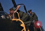 Image of Ground crew with returning RF-4C aircraft Ubon Ratchathani Thailand, 1967, second 13 stock footage video 65675038915