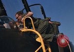 Image of Ground crew with returning RF-4C aircraft Ubon Ratchathani Thailand, 1967, second 20 stock footage video 65675038915